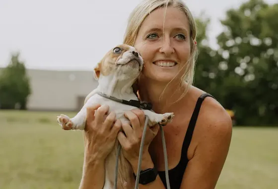A puppy in training with a K9aholics trainer